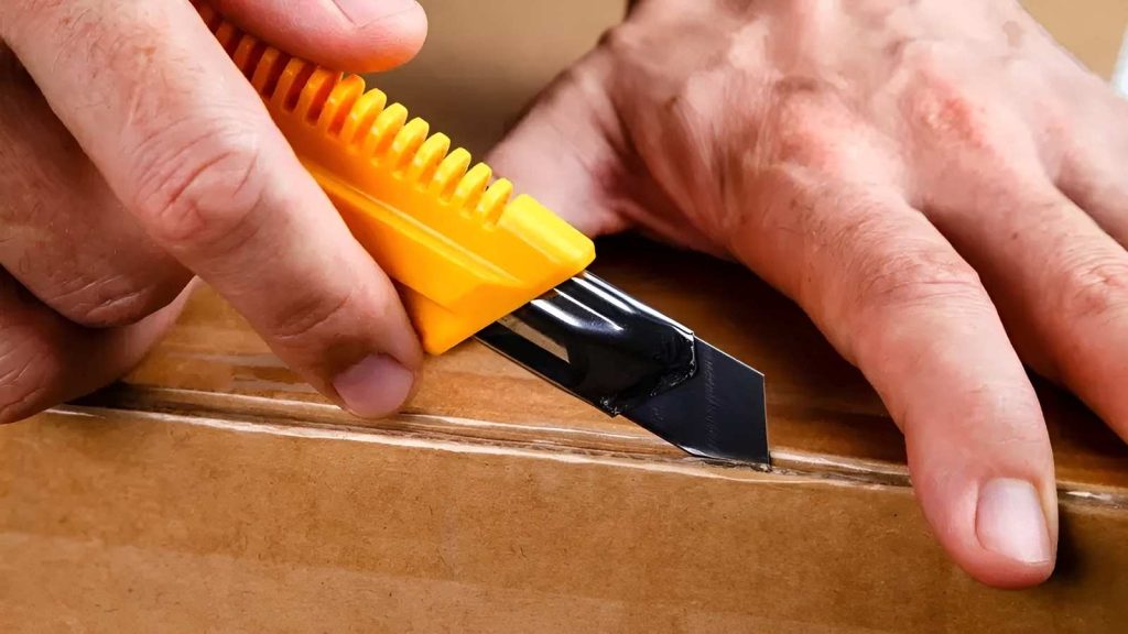 Dao rọc giấy Oly